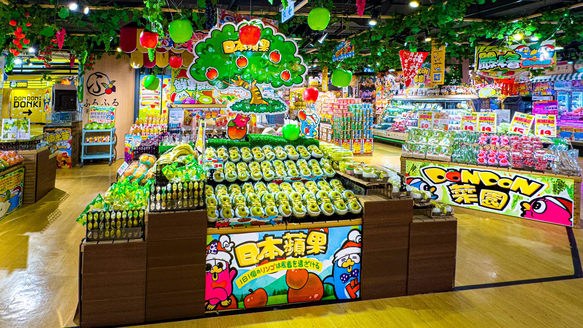 Photo of apple tree and apples on ceiling at don don donki hong kong kowloon Whampoa